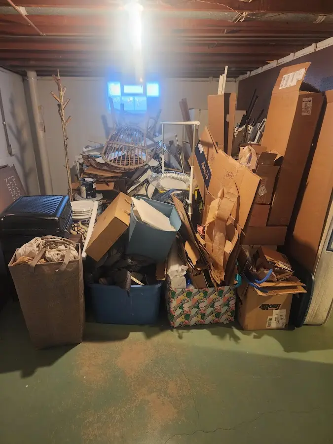 Roll-off dumpster container at job site for 20 Yard Dumpster Rental in Waller